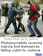 Some photojournalists covering Katrina have been roughed-up and robbed of their cameras by police officers.