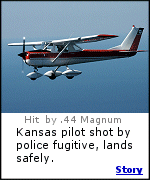Mike Spicer of Clay Center, Kansas, shot from the ground by fugitive while helping in police search.  Click for story.
