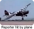 A reporter is struck by a low-flying plane, and other interesting videos.